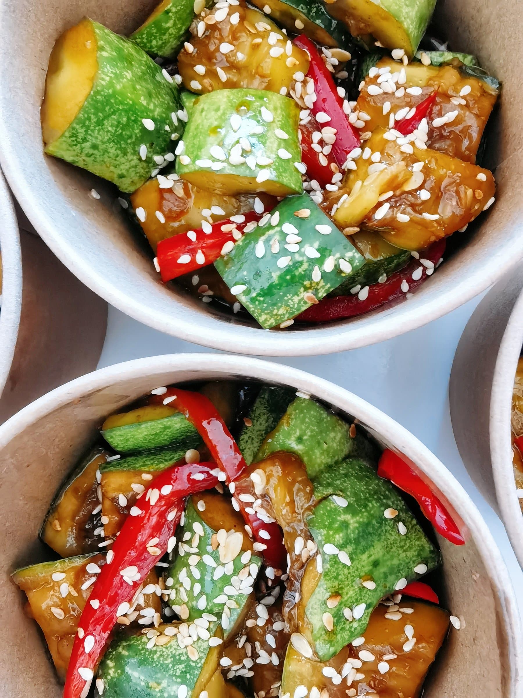 Smashed cucumber salad, a fresh vegetable side prepared during a cooking session